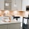 Spacious and well lit kitchen with wood flooring and stainless steel appliances